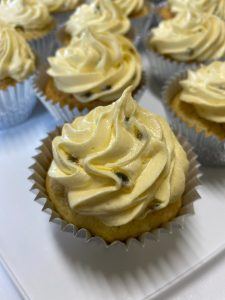 coconut cupcakes with passionfruit icing